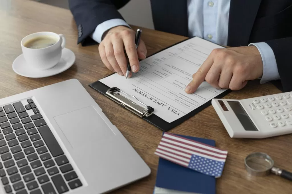 visa application composition with American flag - TN Visa Expert